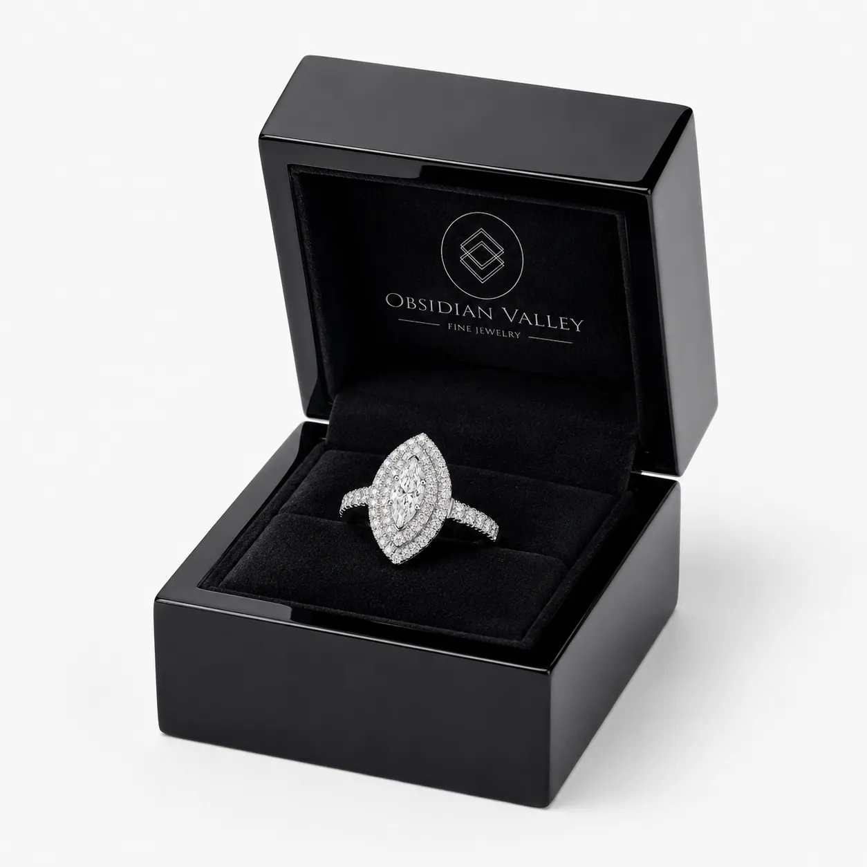 An Obsidian Valley ring presented in its black lacquer box